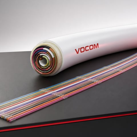 Indoor rollable ribbon fiber optic cable with white jacket (illustrative render)